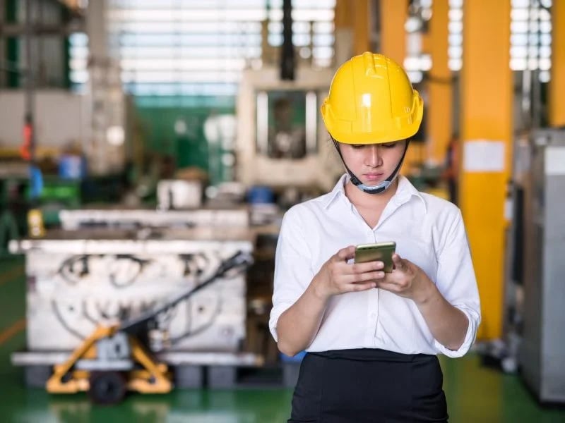 Employee looking at phone